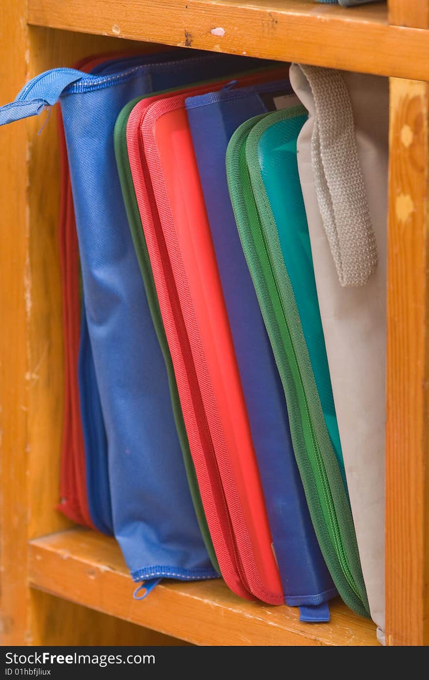 Folders With Papers On A Shelf.