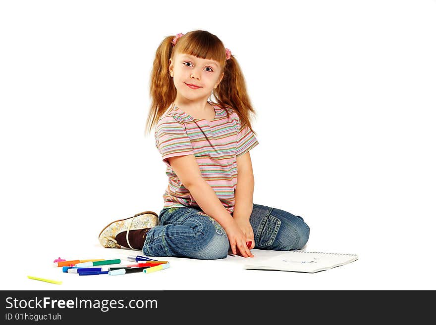 The girl draws on a white background