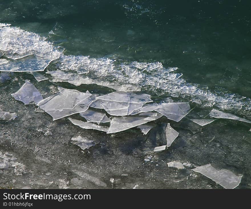 Cracked pieces of ice on river. Cracked pieces of ice on river