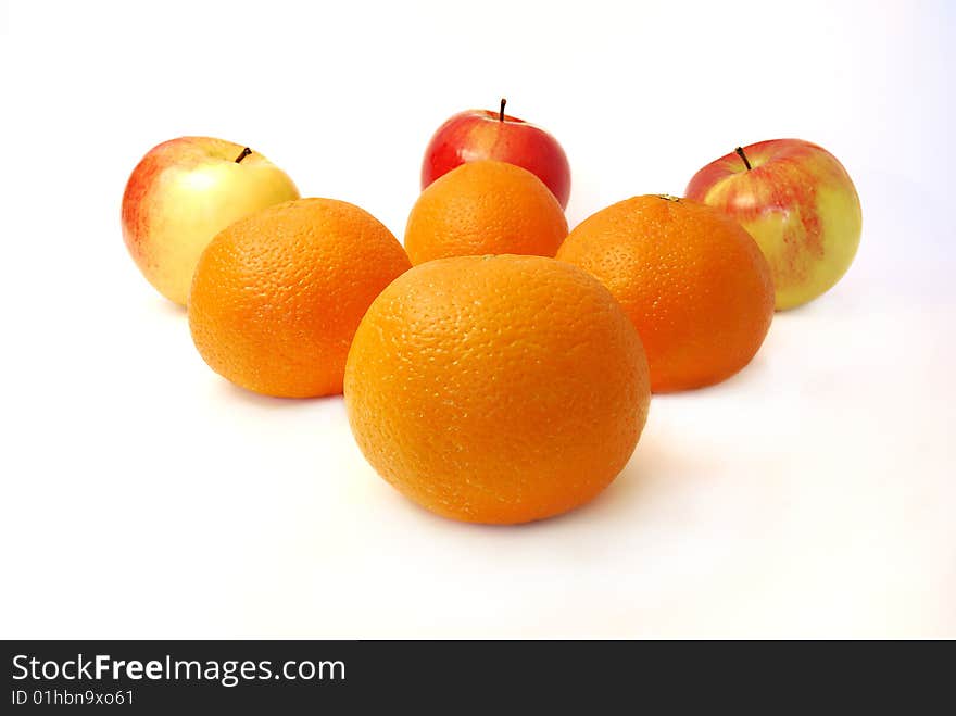 Four Mandarines And Three Apples