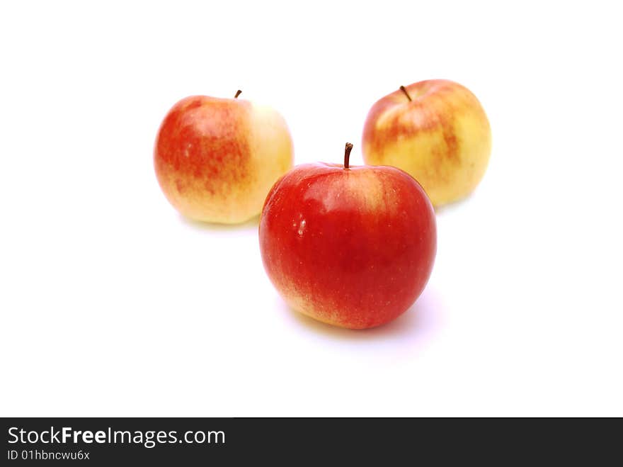 Three red apples on a white background. Three red apples on a white background