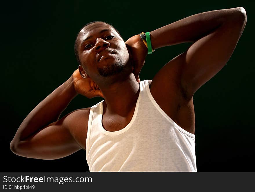 Young african american male on black background