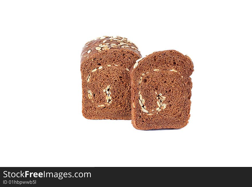 Rye Bread Full Of Seeds On A White Background.