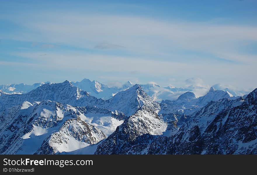 Alps peaks through clouds in Austria. Alps peaks through clouds in Austria