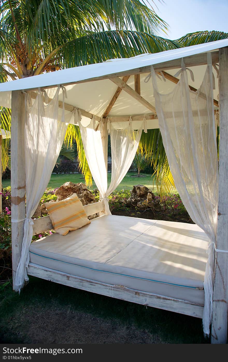 Canopy bed in tropical resort