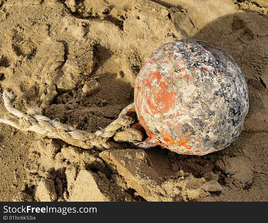 Iron shackle on the beach