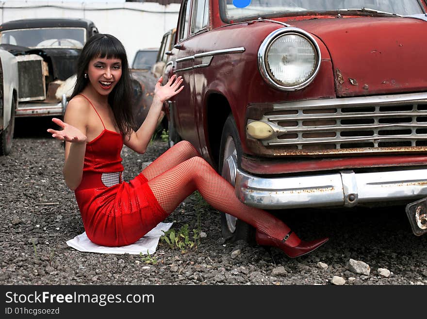 Girl beside car