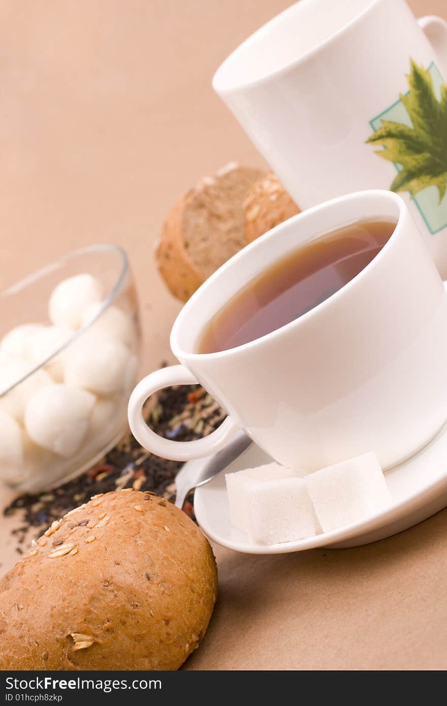 Cup of tea, mozzarella and bread closeup