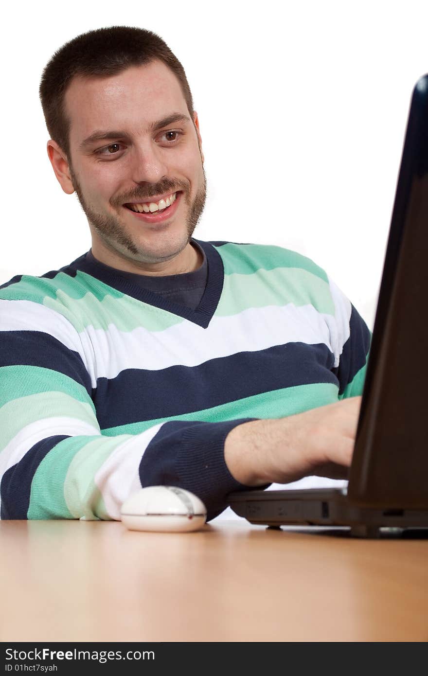 Young man working with his notebook. Young man working with his notebook