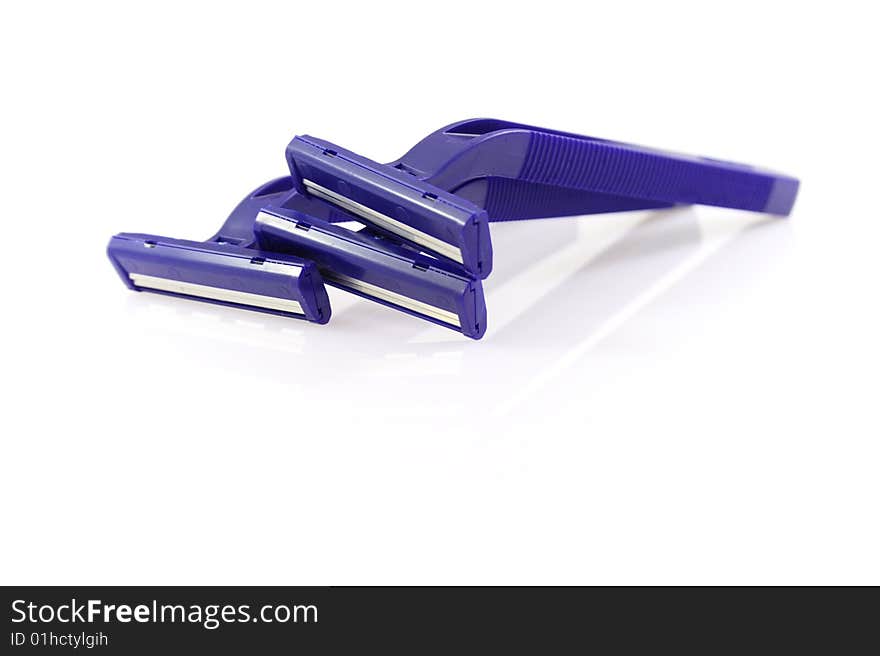 Disposable shaving razors on a white background