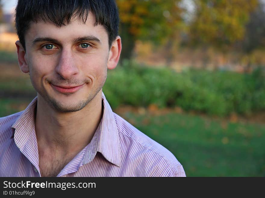 Portrait  beauty  young guy  on the garden