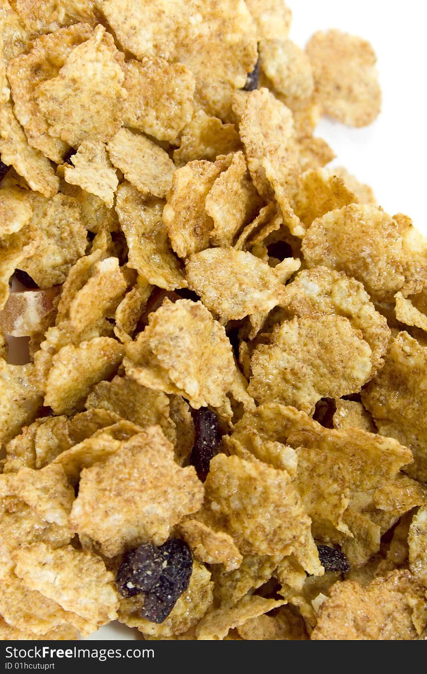 Cornflakes background , close up on white