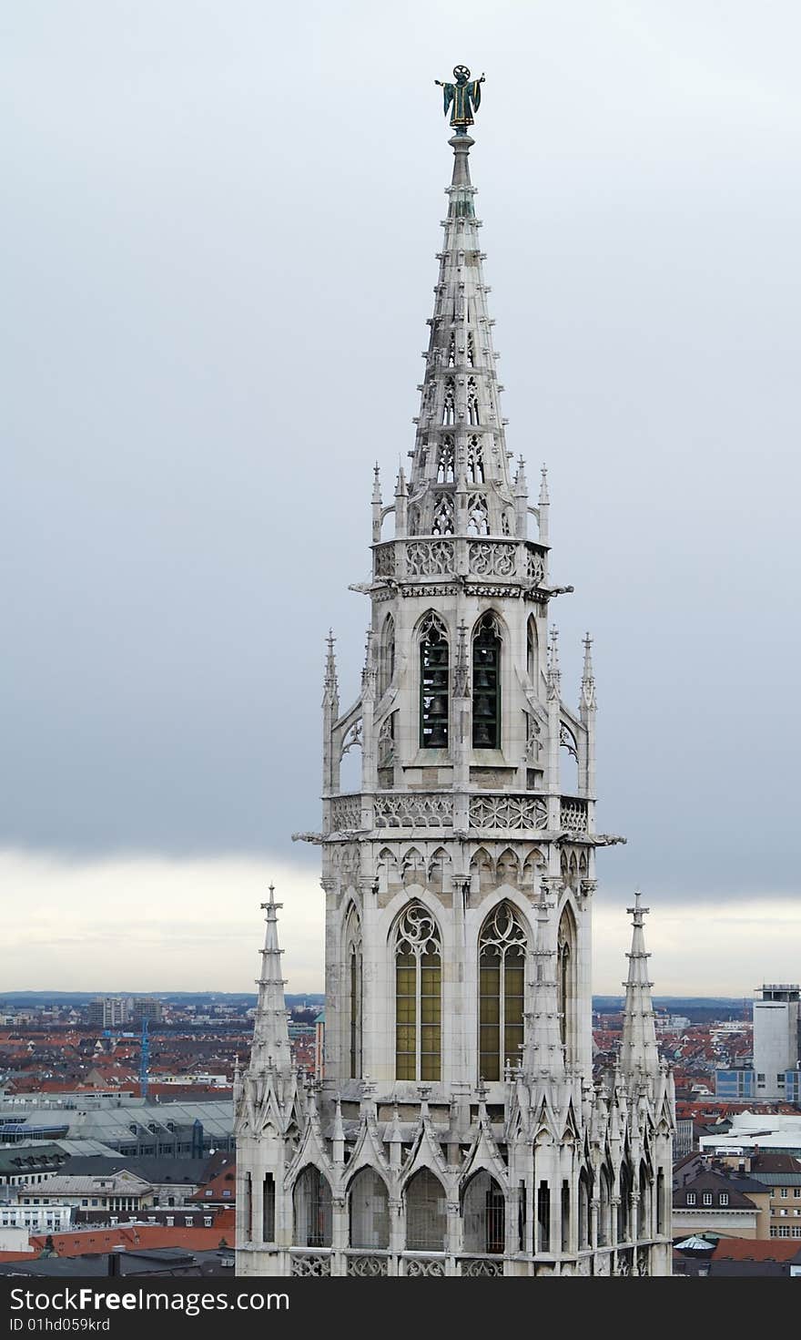 Peak of the New Town Hall (Neuen Rathaus) placed in the center of Munich on Marienplatz, Bayer, Germany. Peak of the New Town Hall (Neuen Rathaus) placed in the center of Munich on Marienplatz, Bayer, Germany