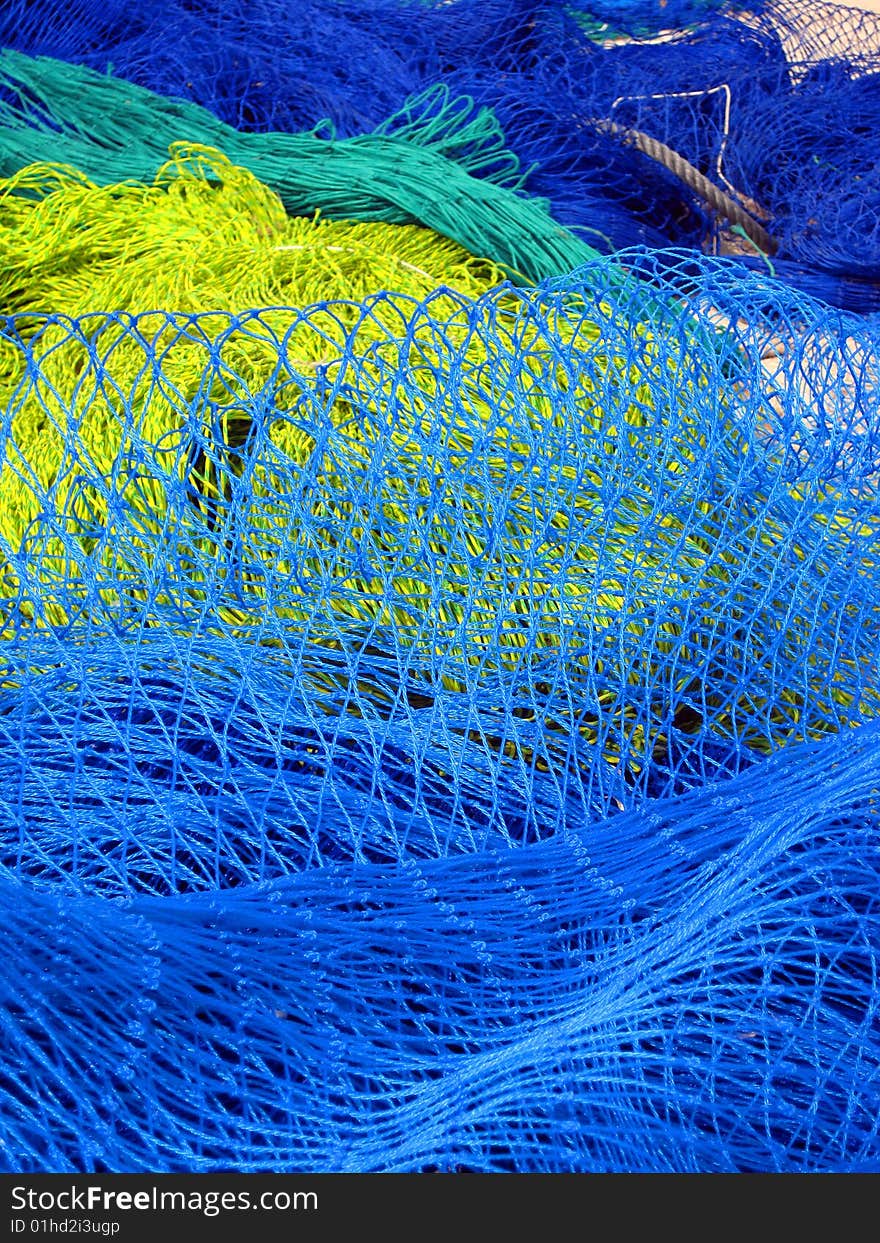 Colorful heap of fishing nets. Colorful heap of fishing nets