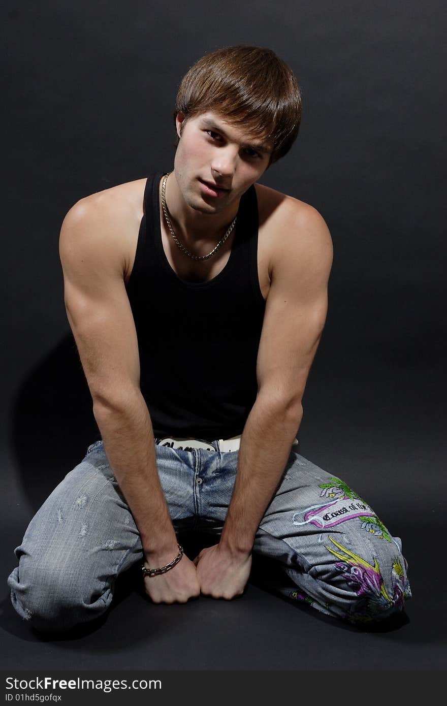 Young man on a black background