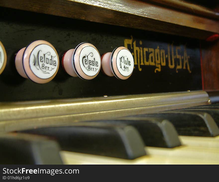 Close up of reed organ stops. Close up of reed organ stops