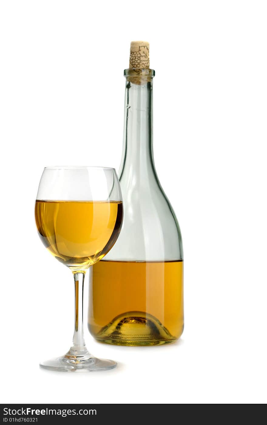 Glass and bottle of excellent white wine on a white background