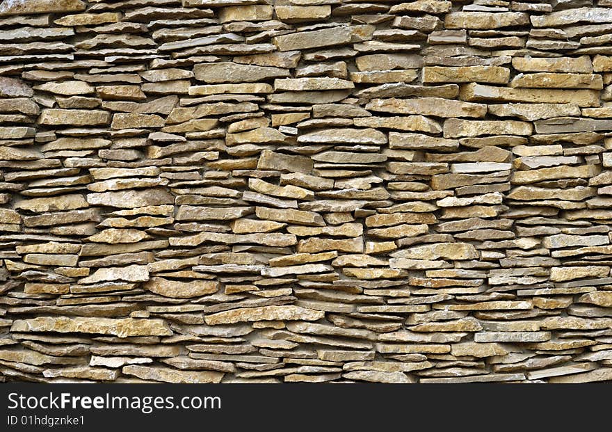 Fragment of artistic wall made with multiple stones. Fragment of artistic wall made with multiple stones