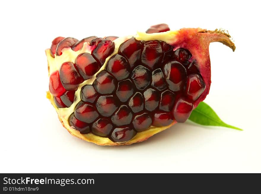 Juicy pomegranate on a white background. Juicy pomegranate on a white background