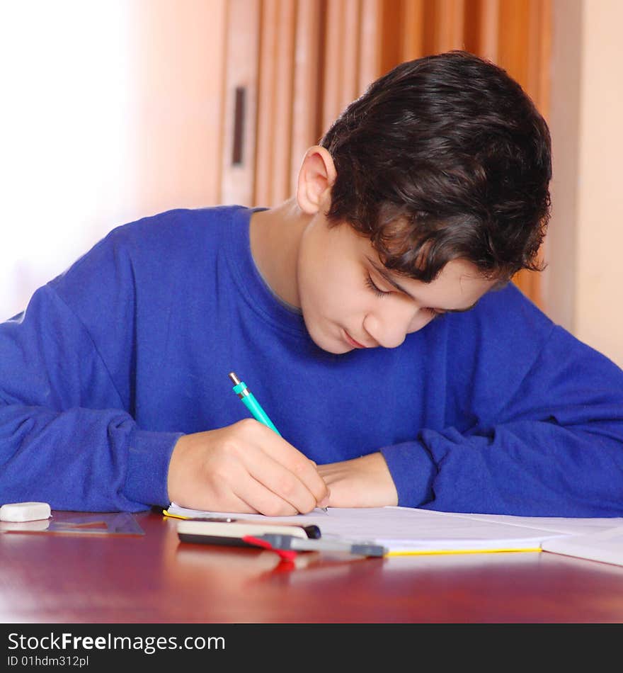 Student at the table in the working room, projected future. Student at the table in the working room, projected future