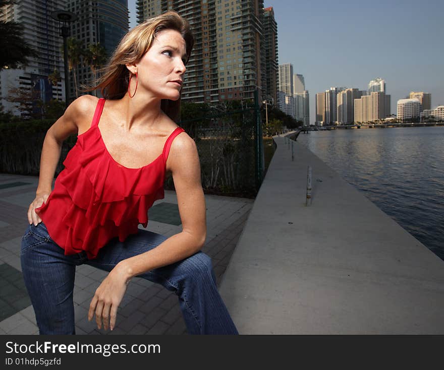 Beautiful woman watching the water