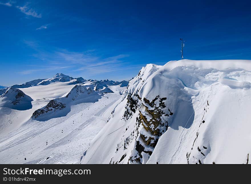 View from peak in ski resort. View from peak in ski resort.