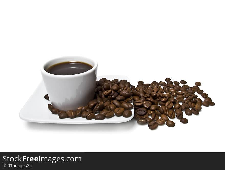 Cup of coffee with coffee grain on a white background