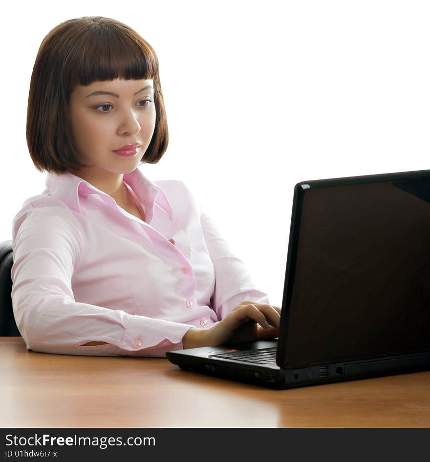 Girl in the office with the computer. Girl in the office with the computer