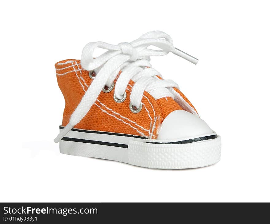 Sneakers orange colour with lace on white background. Sneakers orange colour with lace on white background