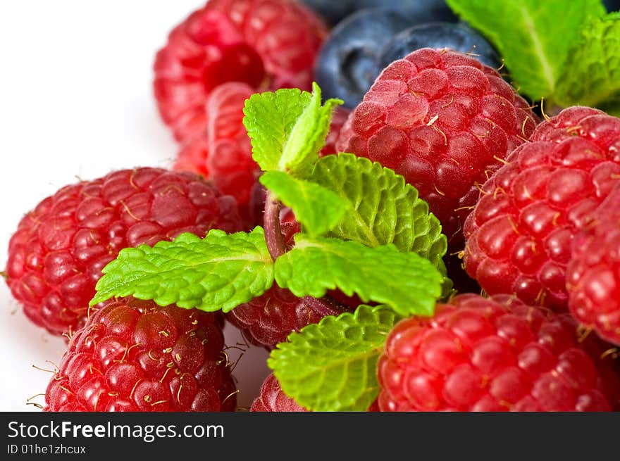 Blueberry and rasperry with mint leaves