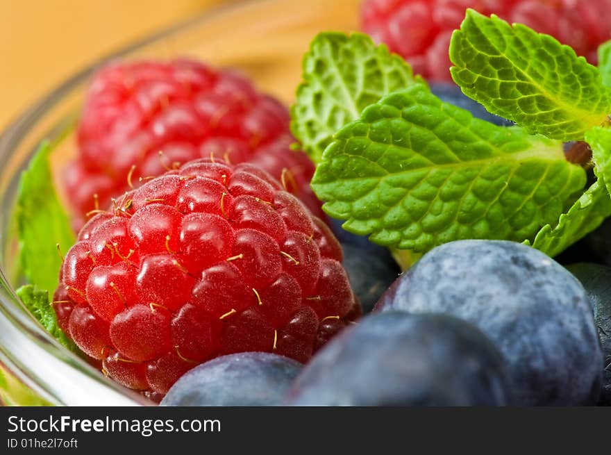 Blueberry, ruspberry and mint leaves