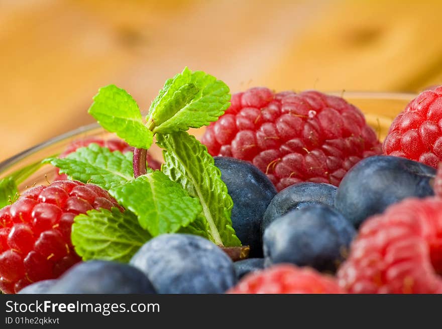 Blueberry, ruspberry and mint leaves