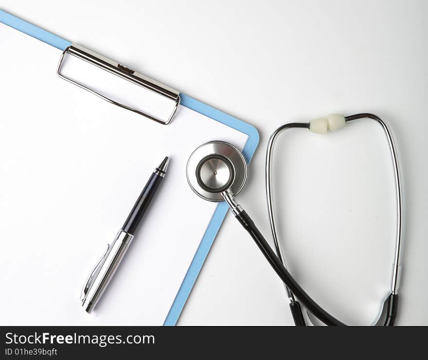 Blank clipboard with modern stethoscope