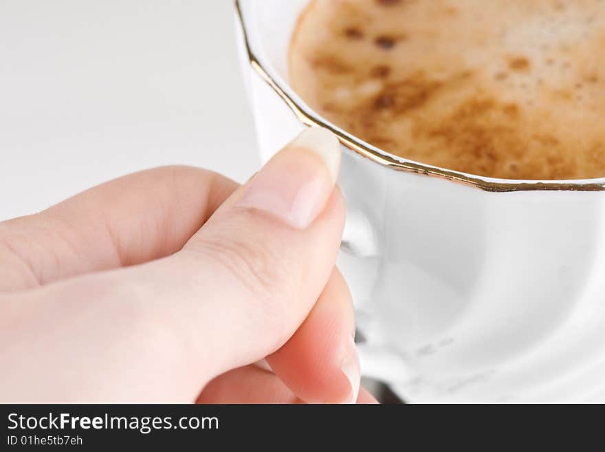 Cappuccino Cup and Hand