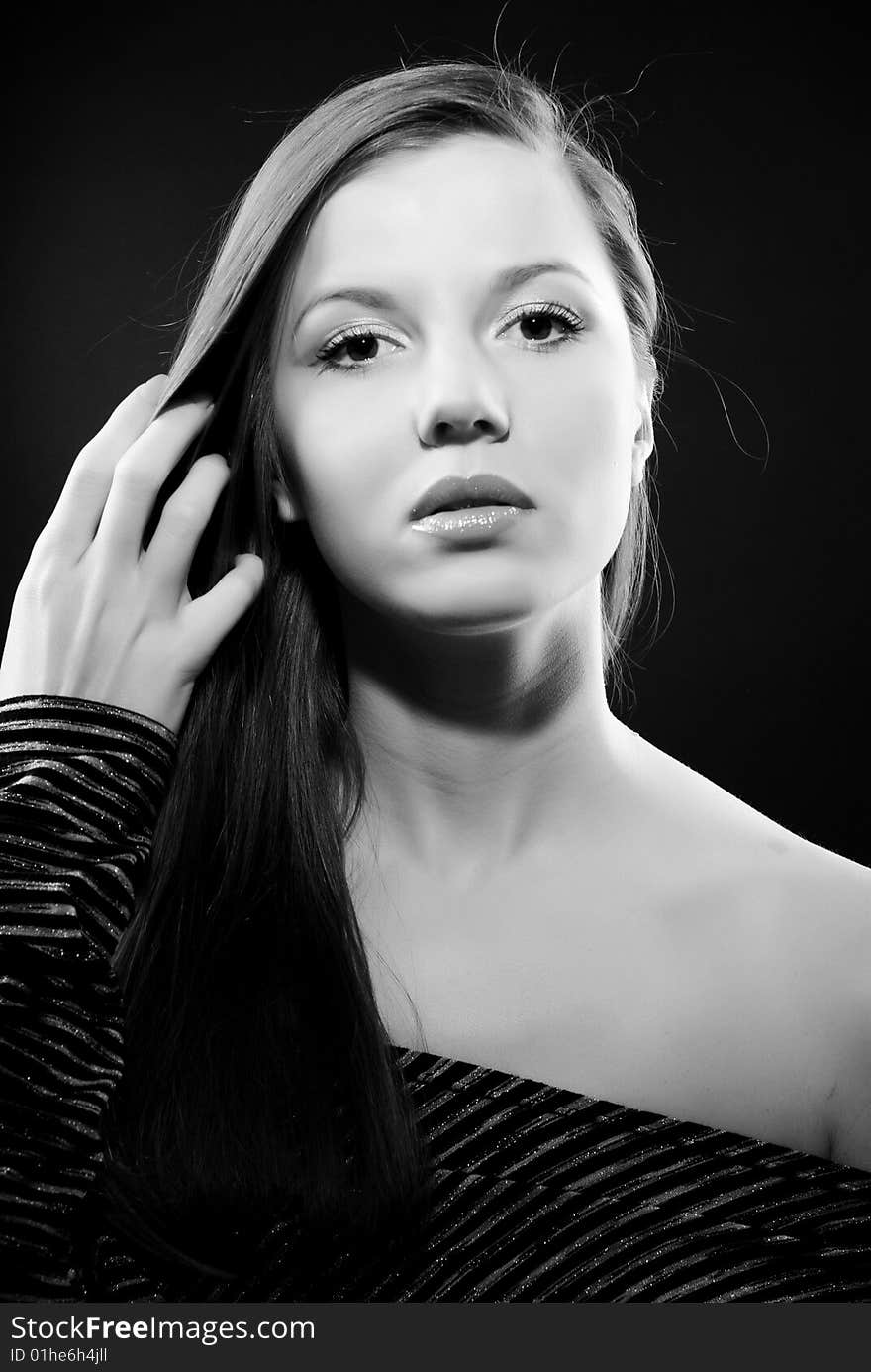 Portrait of young beautiful woman with long hair