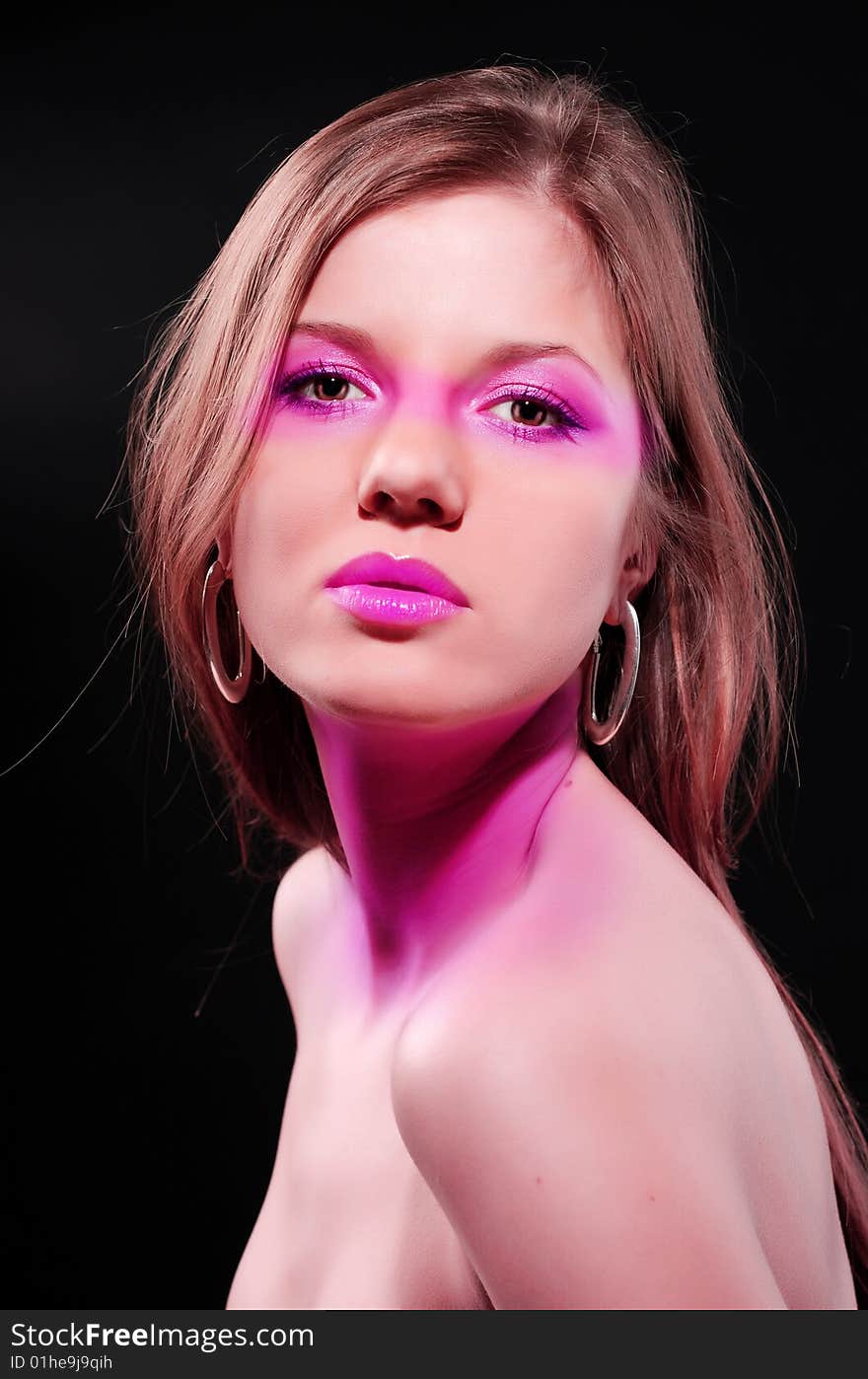 Portrait of beautiful woman with color make-up