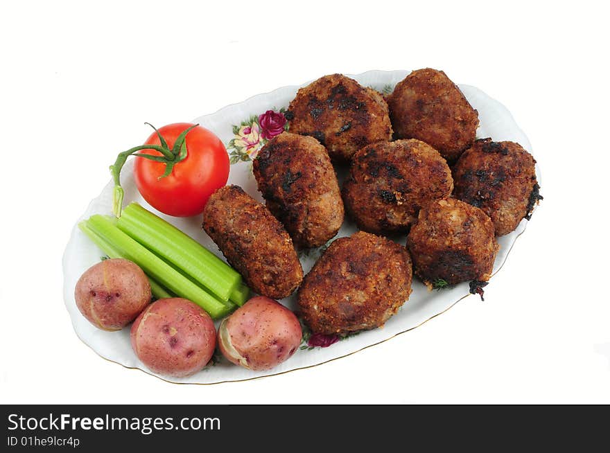A patty of chopped meat, usually coated with bread crumbs and fried; a flat croquette. A patty of chopped meat, usually coated with bread crumbs and fried; a flat croquette.