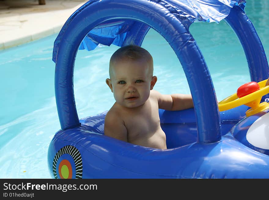 Baby in inflatable toy