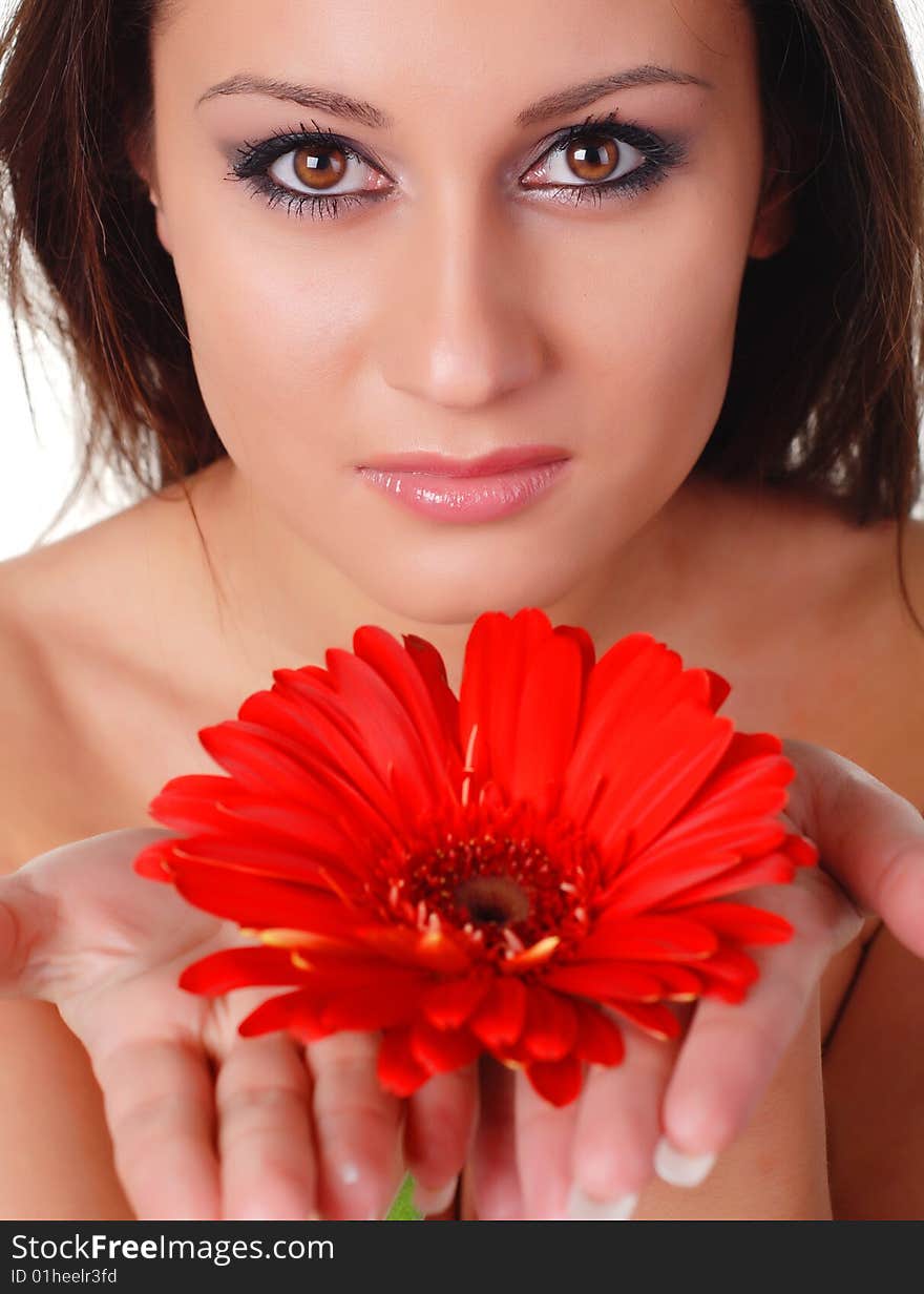 Portrait of a beautiful woman with red flower. Portrait of a beautiful woman with red flower