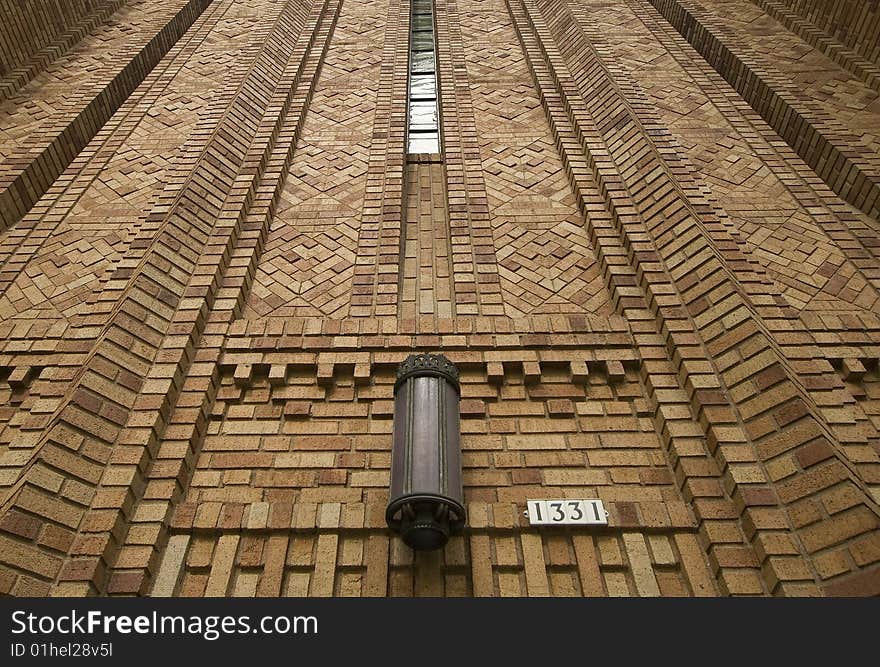 Light sconce on brick wall