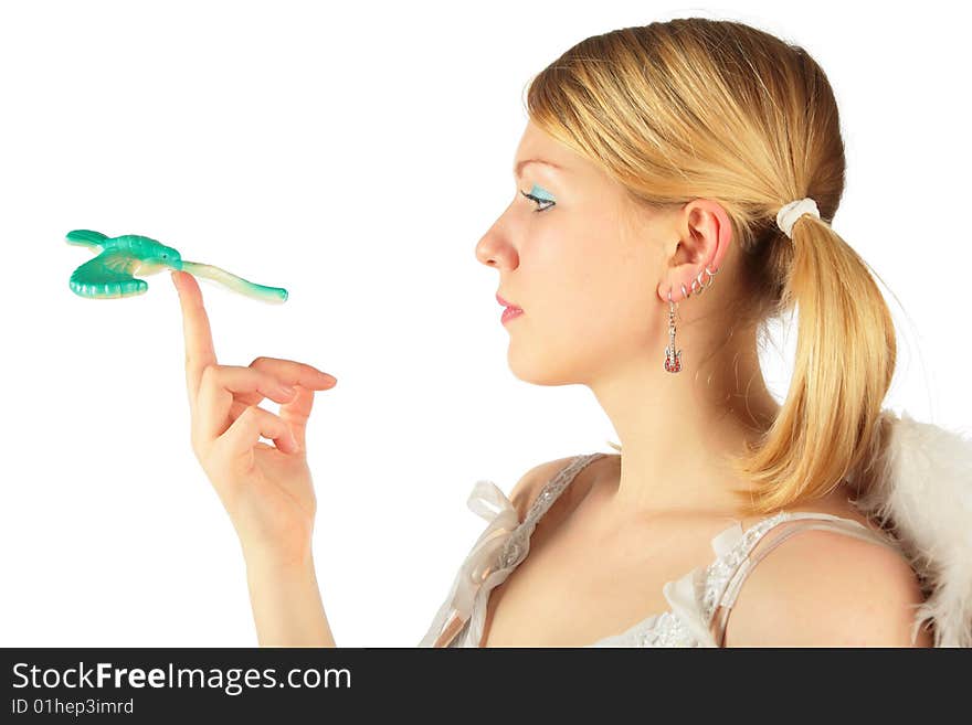 Portrait of girl in angel's costume with toy bird on finger. Portrait of girl in angel's costume with toy bird on finger