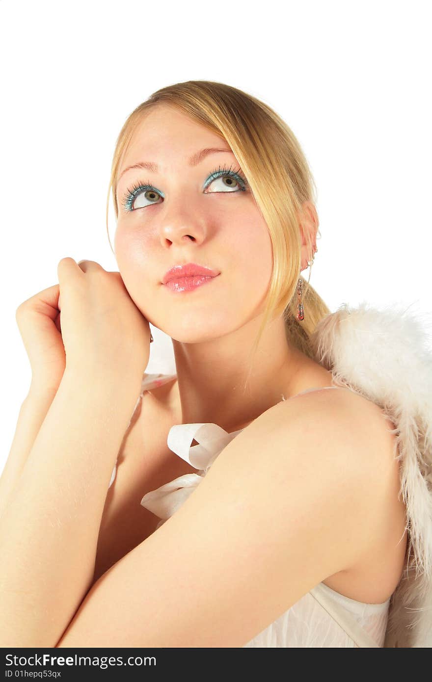 Portrait of blonde girl in angel's costume on white background