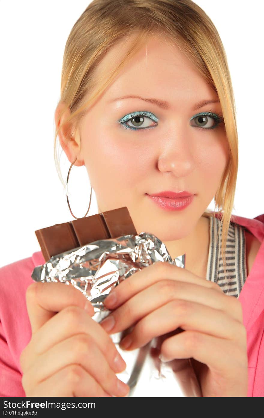 Young girl with chocolate on white background