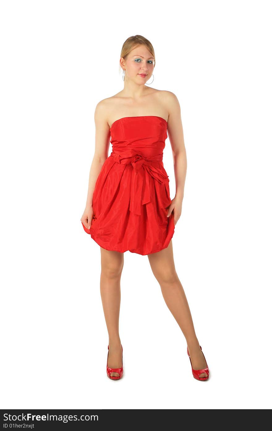 Young blonde girl in red dress and shoes on white background