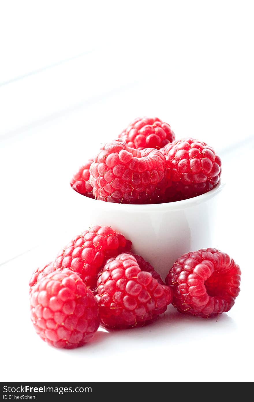 Summer raspberries in the sunlight. Summer raspberries in the sunlight