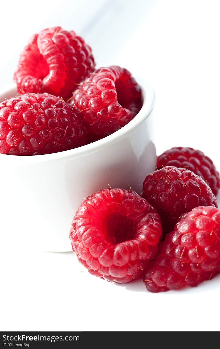 Sweet summer raspberries in the sunlight