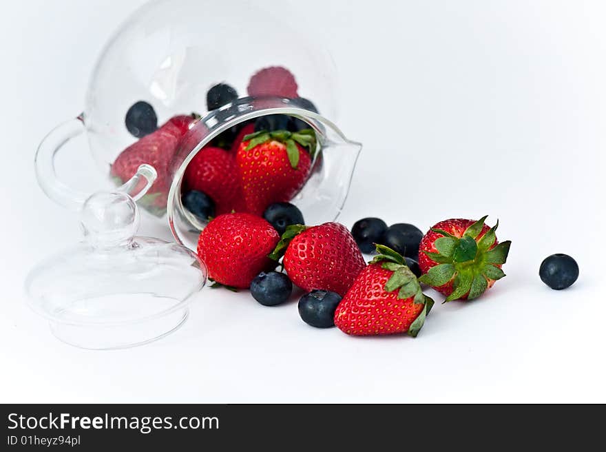 Sweet summer berries in a teapot. Sweet summer berries in a teapot