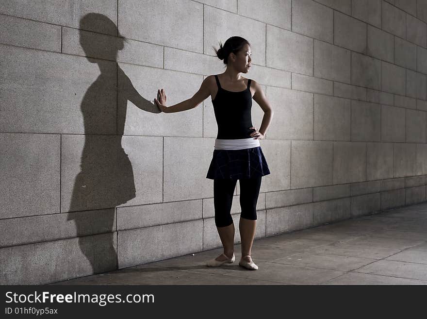 A female dancer dancing in the outdoors. A female dancer dancing in the outdoors