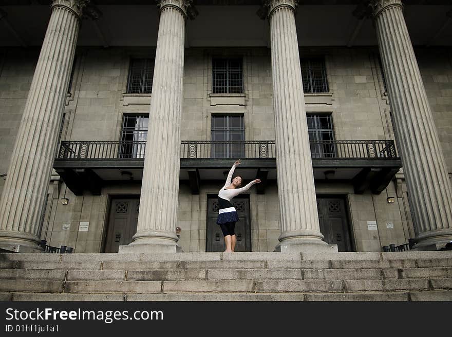 A female dancer dancing in the outdoors. A female dancer dancing in the outdoors