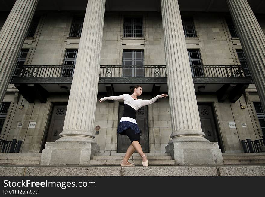 A female dancer dancing in the outdoors. A female dancer dancing in the outdoors